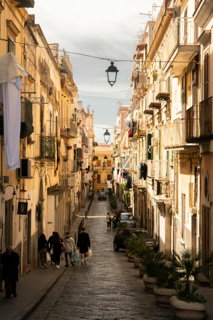 A picturesque Italian street with traditional architecture, capturing daily life.